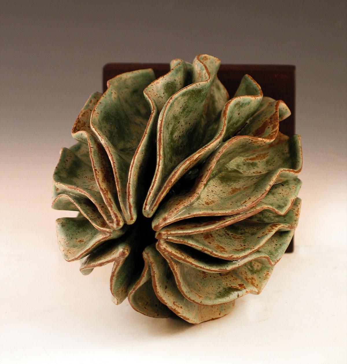 “Verdant”, glazed green ceramic  with wavy shell - Sculpture by Elaine Lorenz