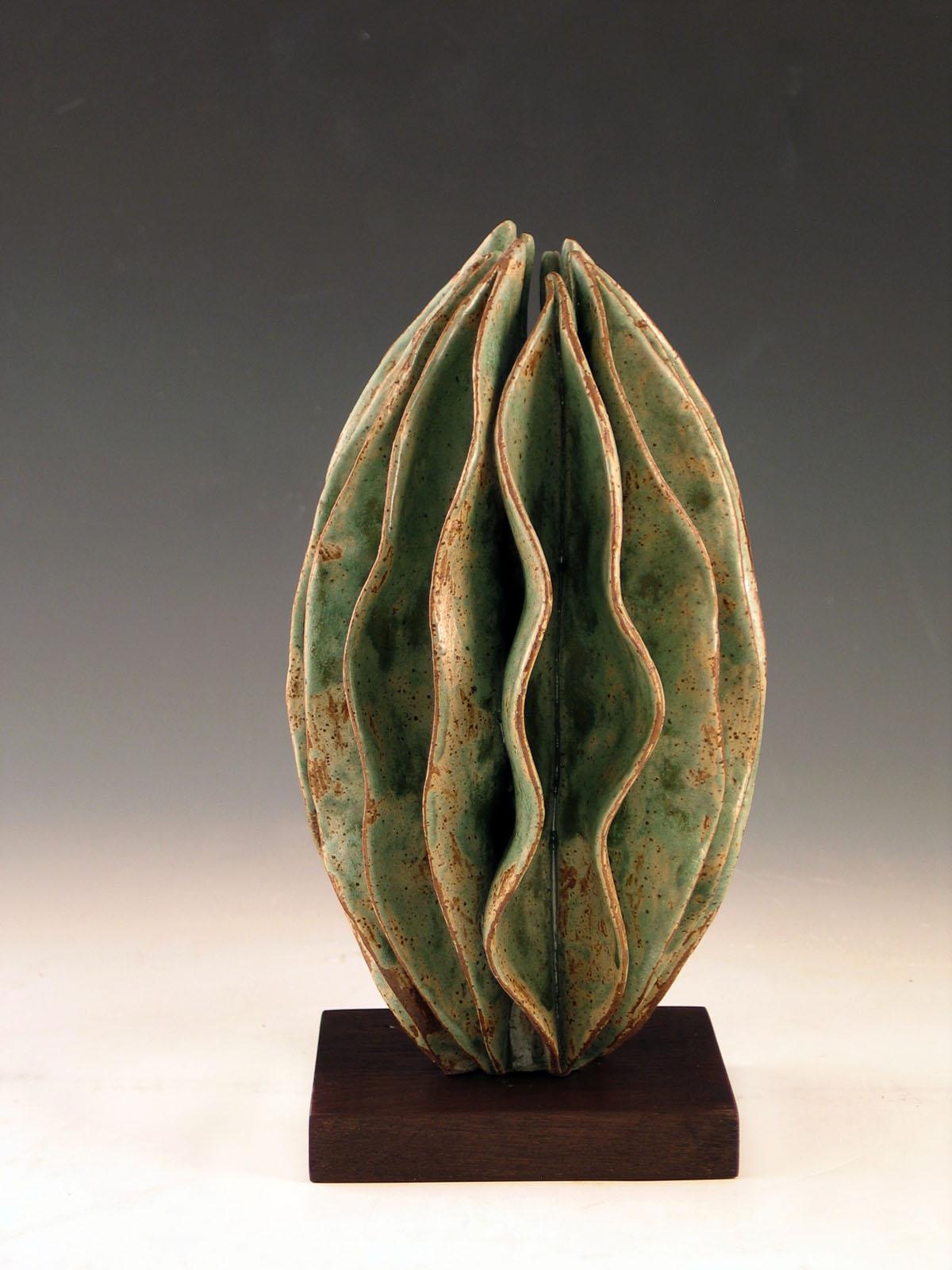 Elaine Lorenz Abstract Sculpture - “Verdant”, glazed green ceramic  with wavy shell