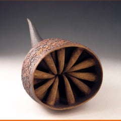 “Withdrawn”, textured ceramic  in reds and browns