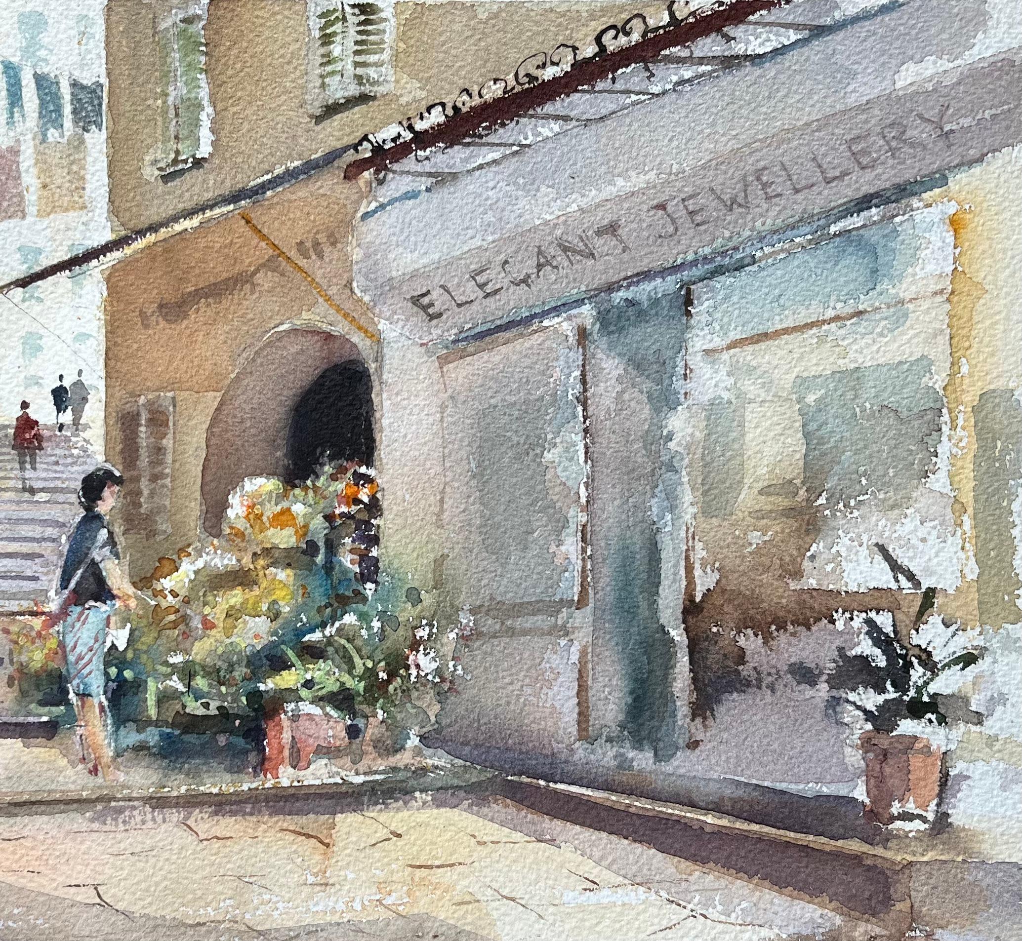 Acuarela original de una escena callejera mediterránea iluminada por el sol con puestos de flores - Landscape Painting Gris de Elaine Mucklow