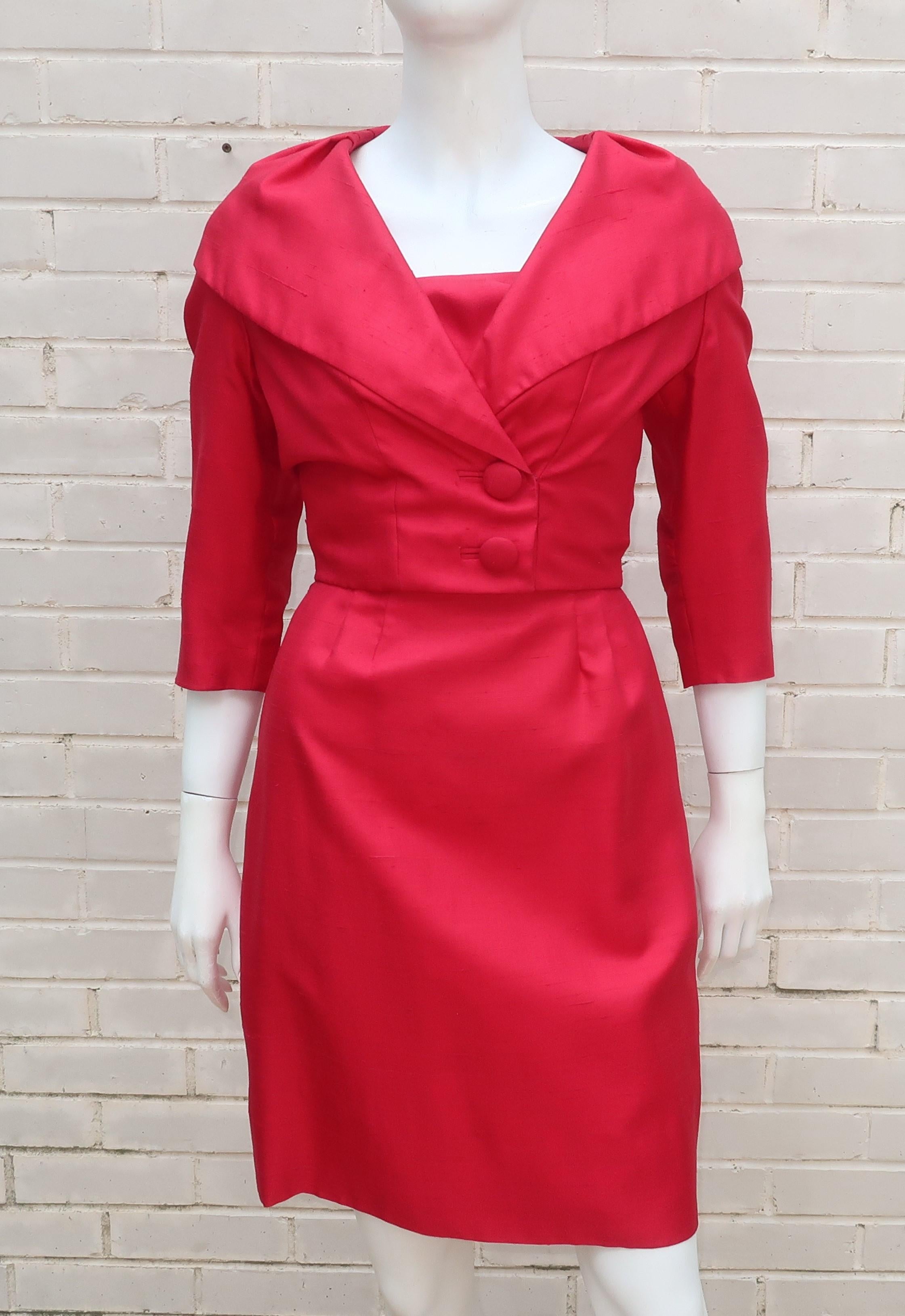 1950’s Elaine Terry red shantung silk dress and jacket set with a red hot Marilyn Monroe vibe.  The dress zips and hooks at the back with a unique ruched bust and upper bodice that creates a lovely neckline.  The cropped jacket buttons at the front