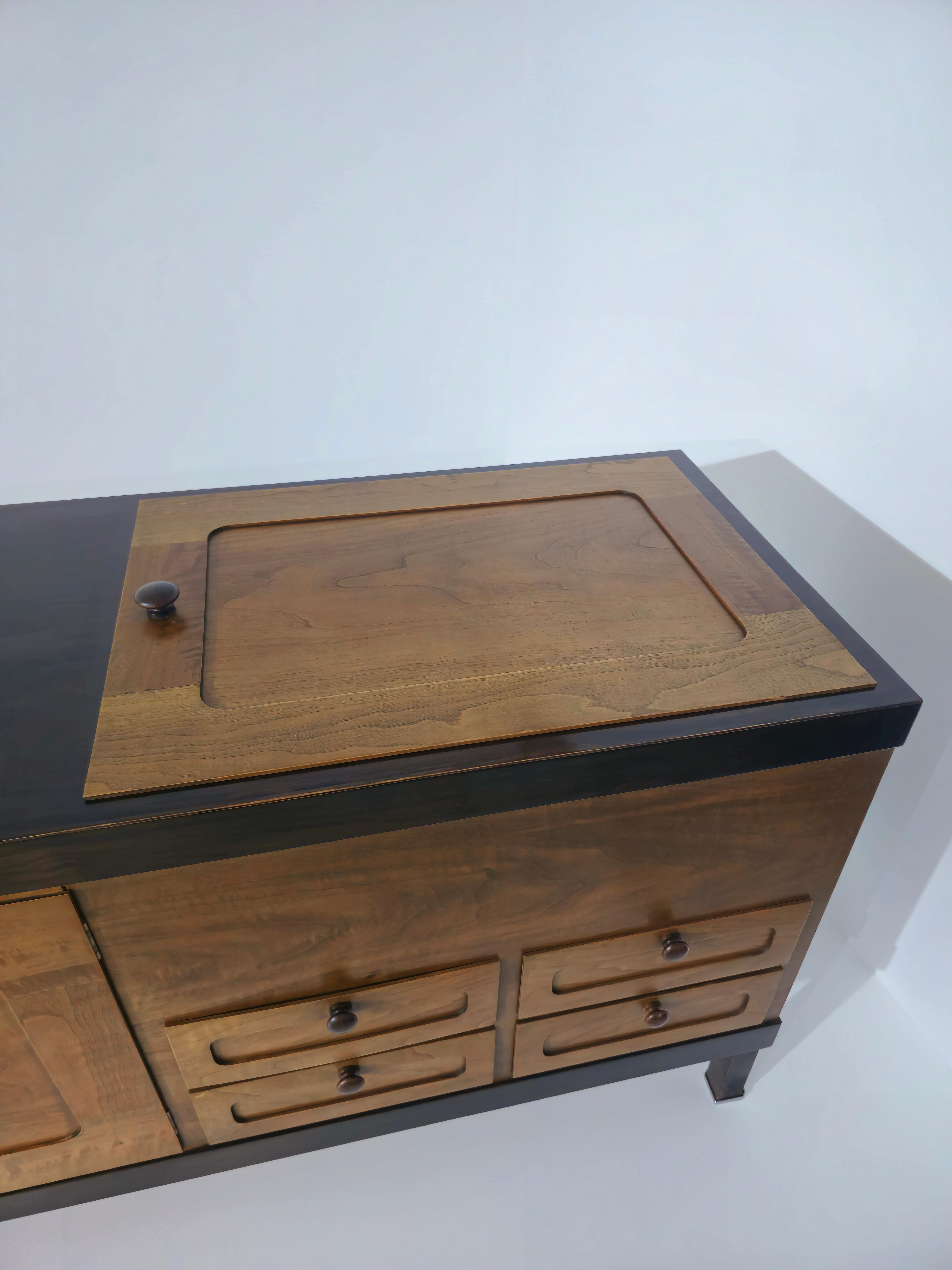 Sideboard cabinet with hinged  two doors,  four visible drawers, bar compartment with trapdoor. This two-tone pairing makes it truly special. Supported by 4 feet with a particular cut and chrome decoration. Exceptional condition. Italian production