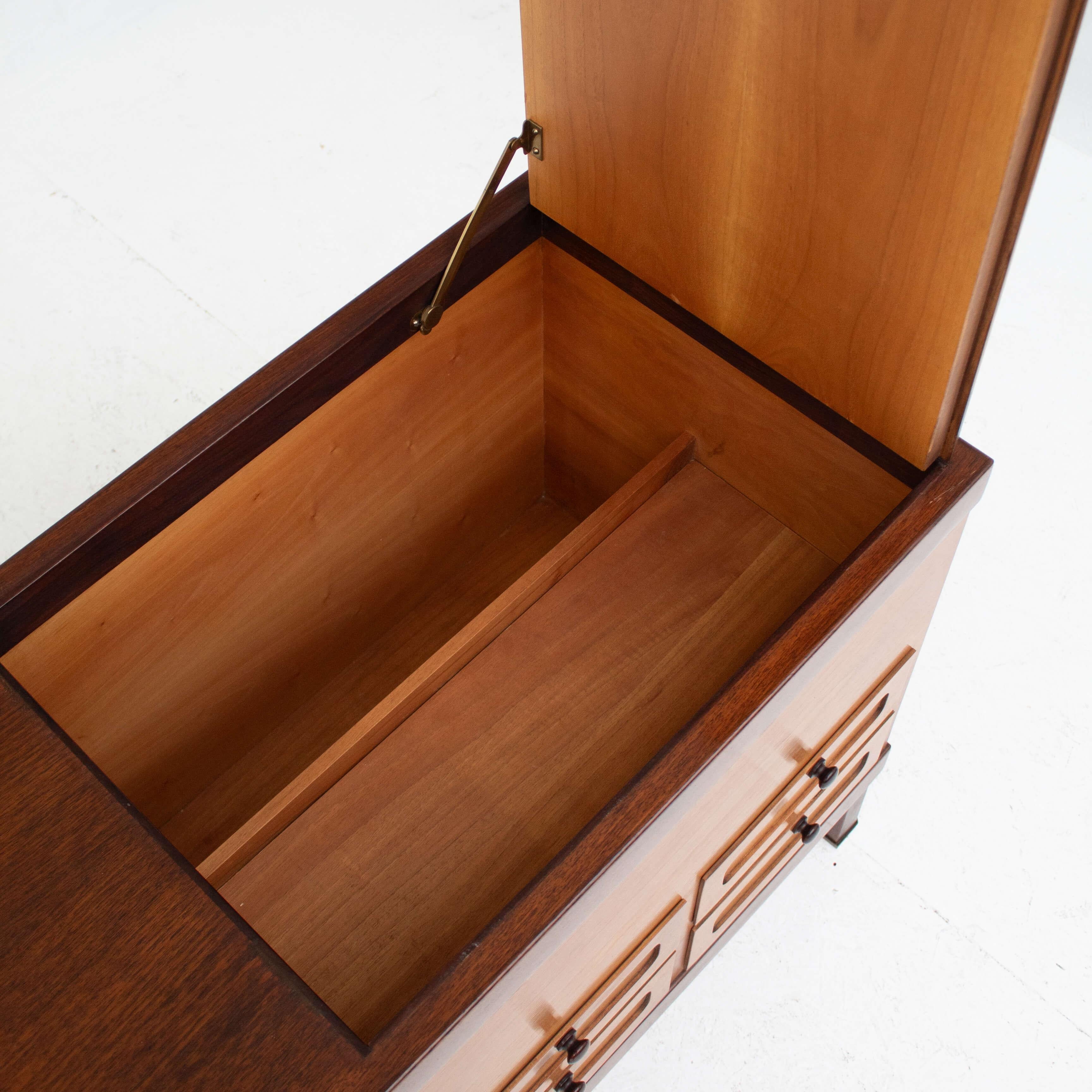 Exceptional ELAM mid-century sideboard designed by Piero Ranzini, produced in Italy during the 1960s–1970s. This elegant piece stands out with its built-in bar compartment, concealed under a hinged trapdoor, adding a sophisticated and functional