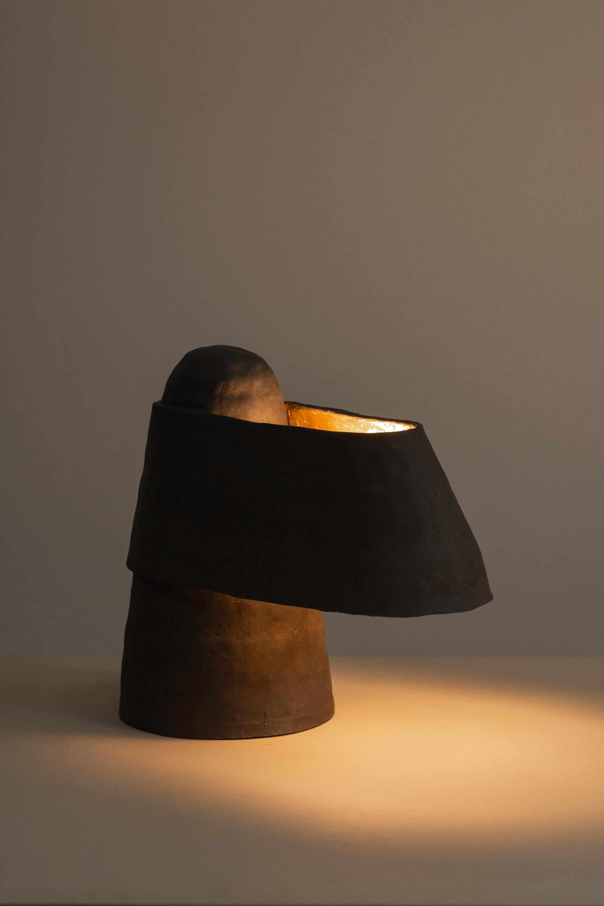 the elara lamp is part of the brutalism series and brings aesthetic references to the homonymous movement of modern architecture that emphasized the 
