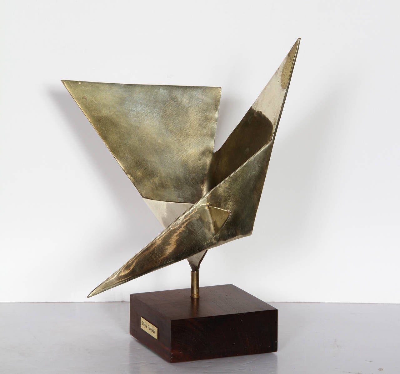 Artist: Elayne Fabrikant
Title: Geometric Abstract
Year: 1970
Medium: Polished Bronze Sculpture, Signature and Date inscribed
Size: 12 in. x 11 in. x 10 in. (30.48 cm x 27.94 cm x 25.4 cm)