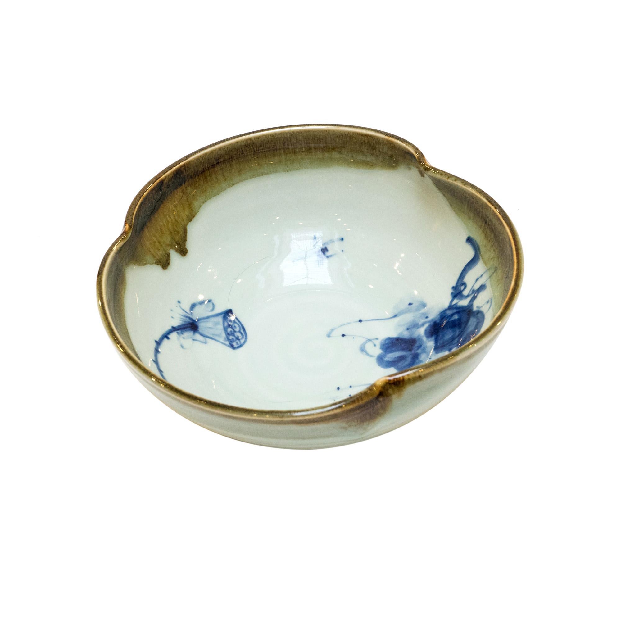 This handmade stoneware bowl features a decorative traditional calligraphy design in blue and white. Due to the handmade nature of this product, slight variation in color, pattern, shape and/or size is to be expected.
 