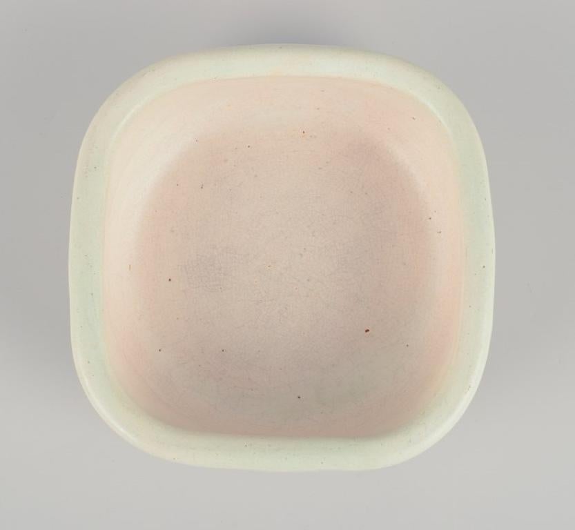 Glazed Elchinger, France. Ceramic bowl with light-toned glaze. Ca. 1960 For Sale