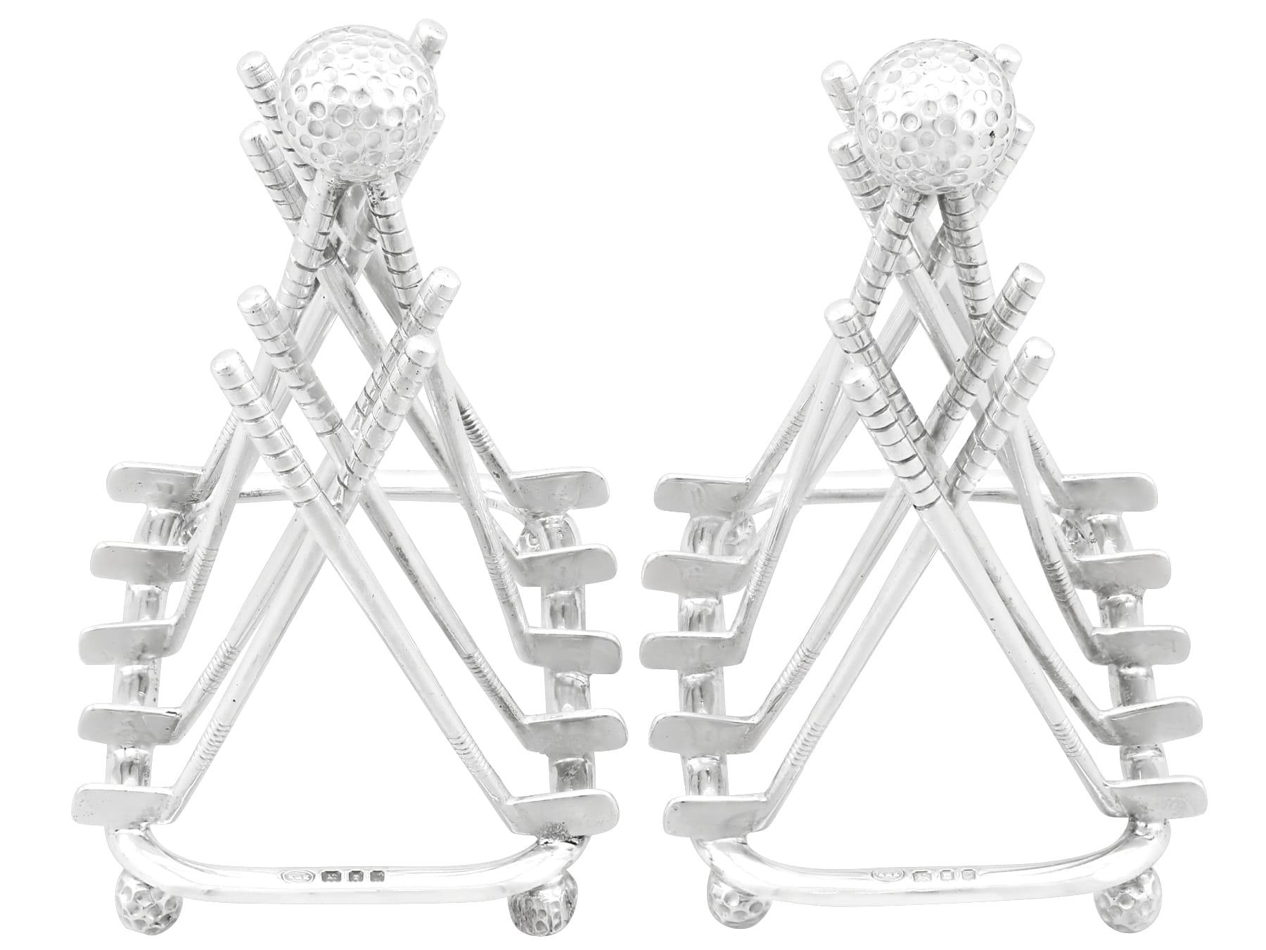 An exceptional, fine and impressive, rare pair of antique George V English sterling silver golf related toast/letter racks; an addition to our dining silverware collection.

This exceptional and rare pair of antique sterling silver toast racks has