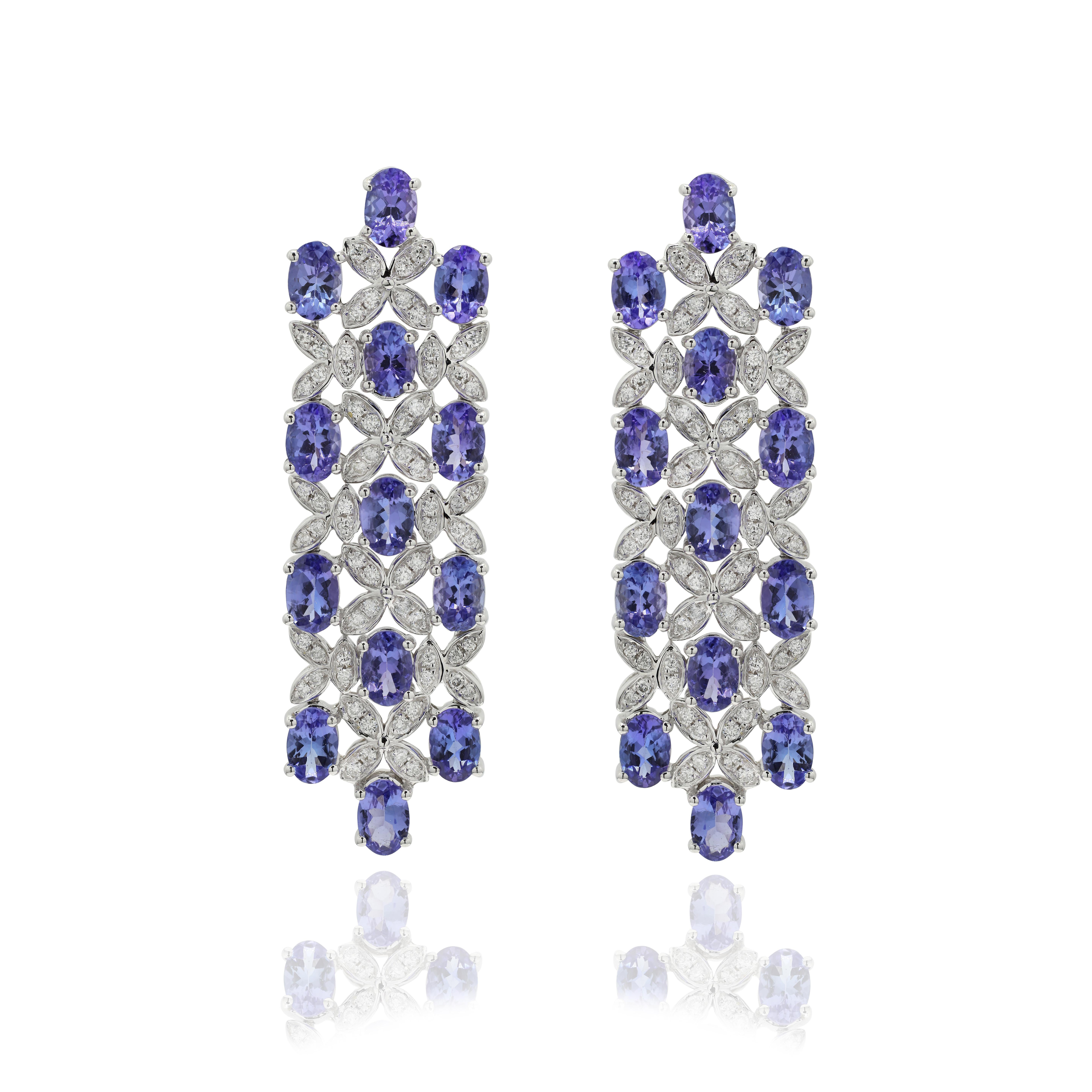 Tanzanite and Diamond Dangle Cocktail Earrings to make a statement with your look. These earrings create a sparkling, luxurious look featuring oval cut gemstone.
If you love to gravitate towards unique styles, this piece of jewelry is perfect for