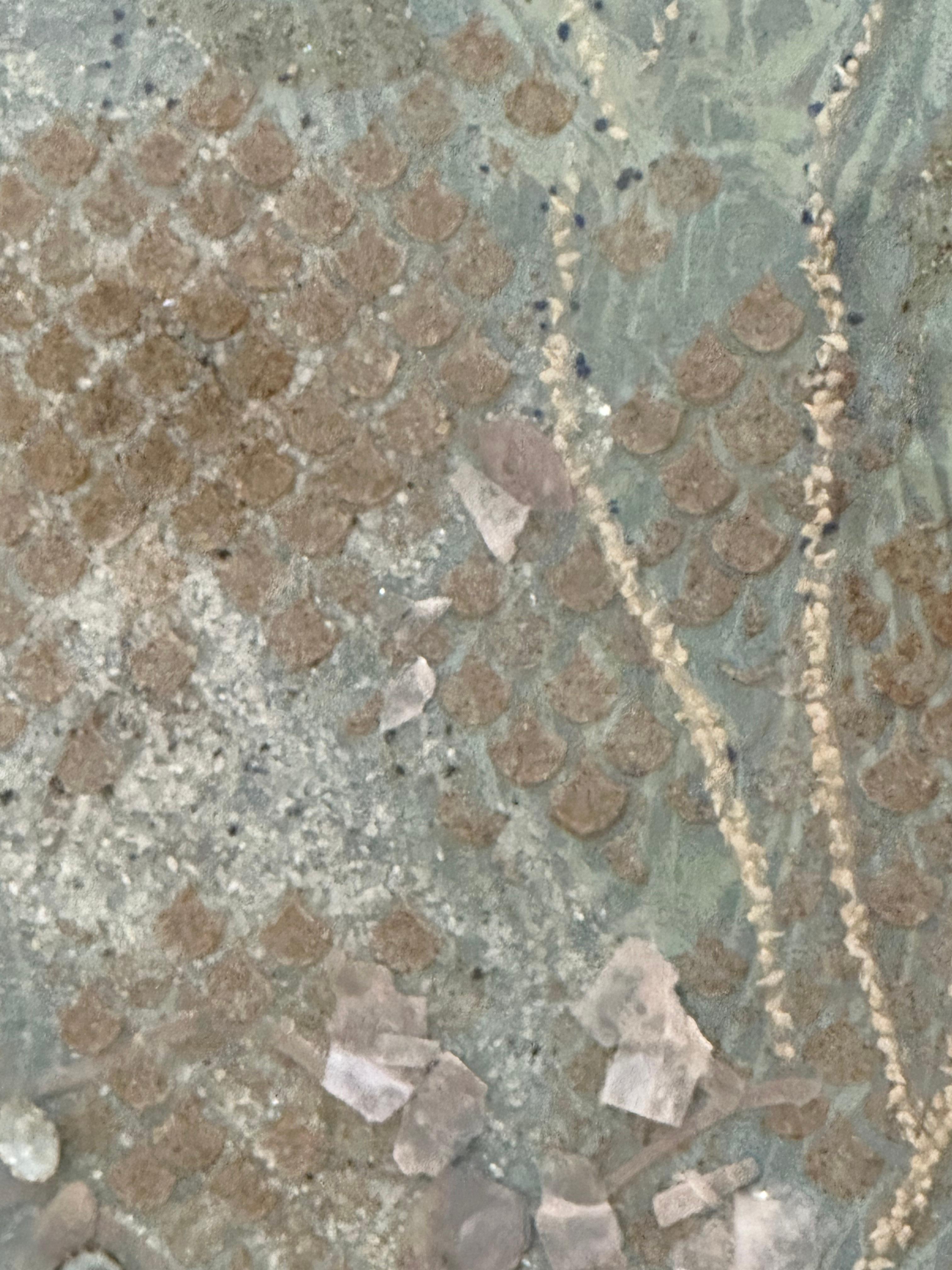 Carefully applied nontraditional materials including limpet, abalone, conch, mother of pearl shell, crushed moonstone, aquamarine, lepidolite, mica, lapis lazuli, and sand create surface texture in intricate patterns on luminous light blue painted