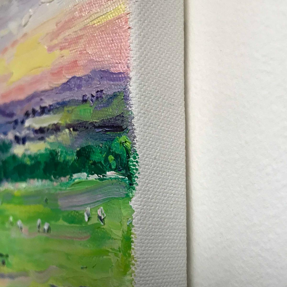 otswold Sheep is an Original Painting by Eleanor Woolley. Painted Plein Air and finished in the Artist's Gloucestershire Studio, this Painting depicts some sheep grazing in the Cotswolds. The sun is setting, and the dusky sky of pinks and yellows is