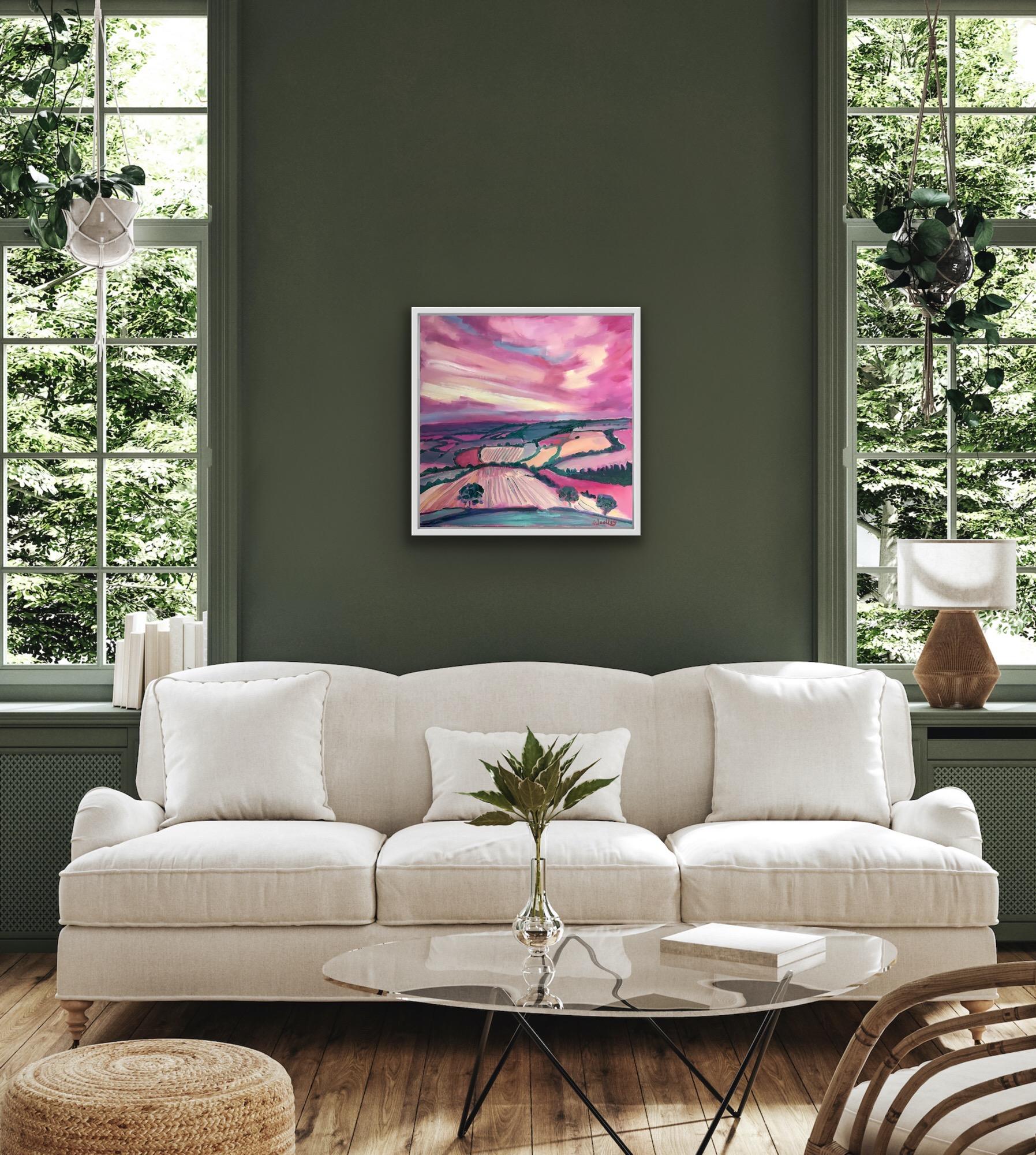 Cotswolds in Pink is an Original Painting by Eleanor Woolley. Inspiration for this Painting is taken from Autumnal walks around Winchcombe this year. Moody pink skies reflect in the magenta fields. The lovely stripes of the ploughed fields lead our