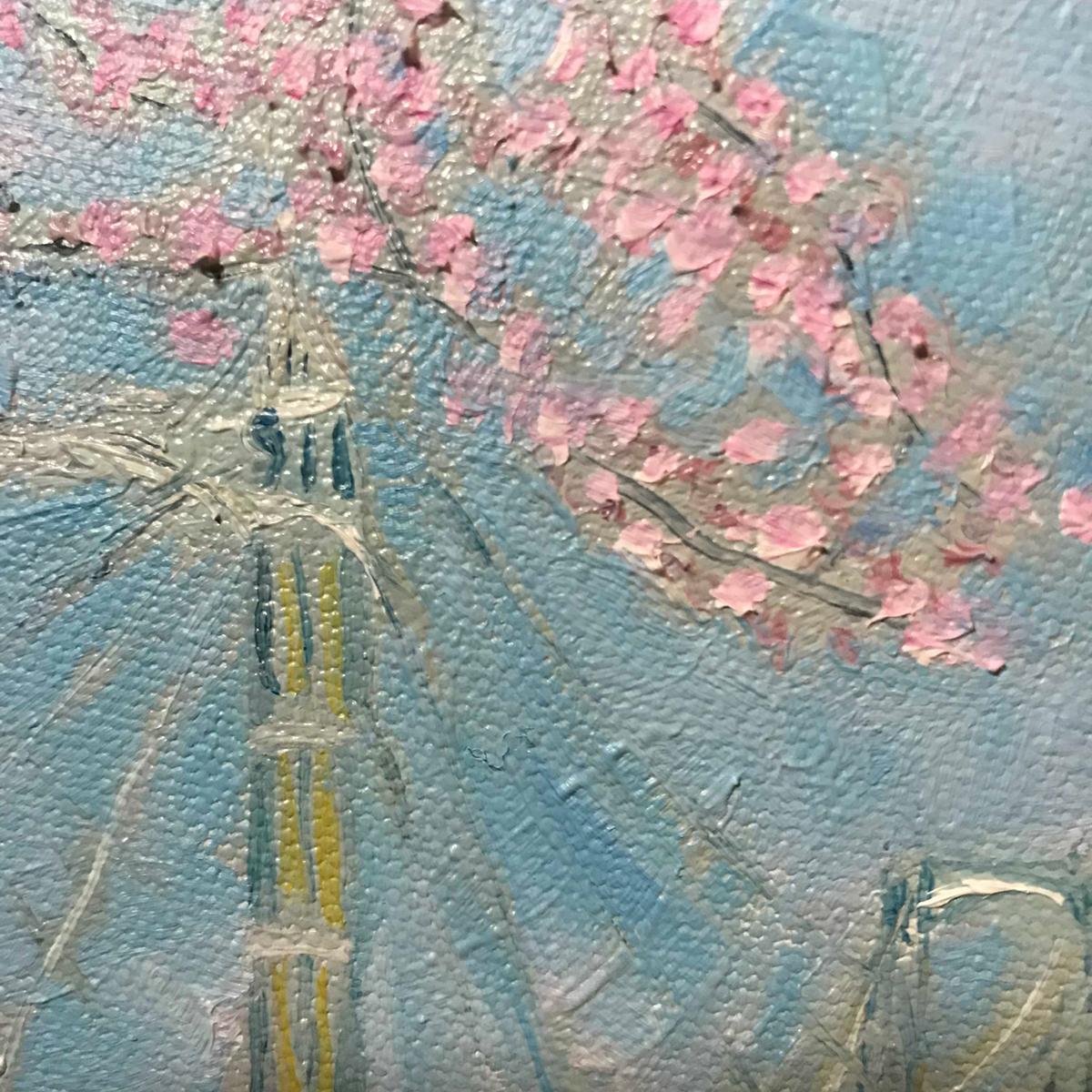 This painting is of Albert Bridge on the River Thames. It is spring and the early prolific blossom is beautiful pink against the light blue sky. Its huge dark piers contrast against the water and reflect on it's moving surface.

The bridge spans the