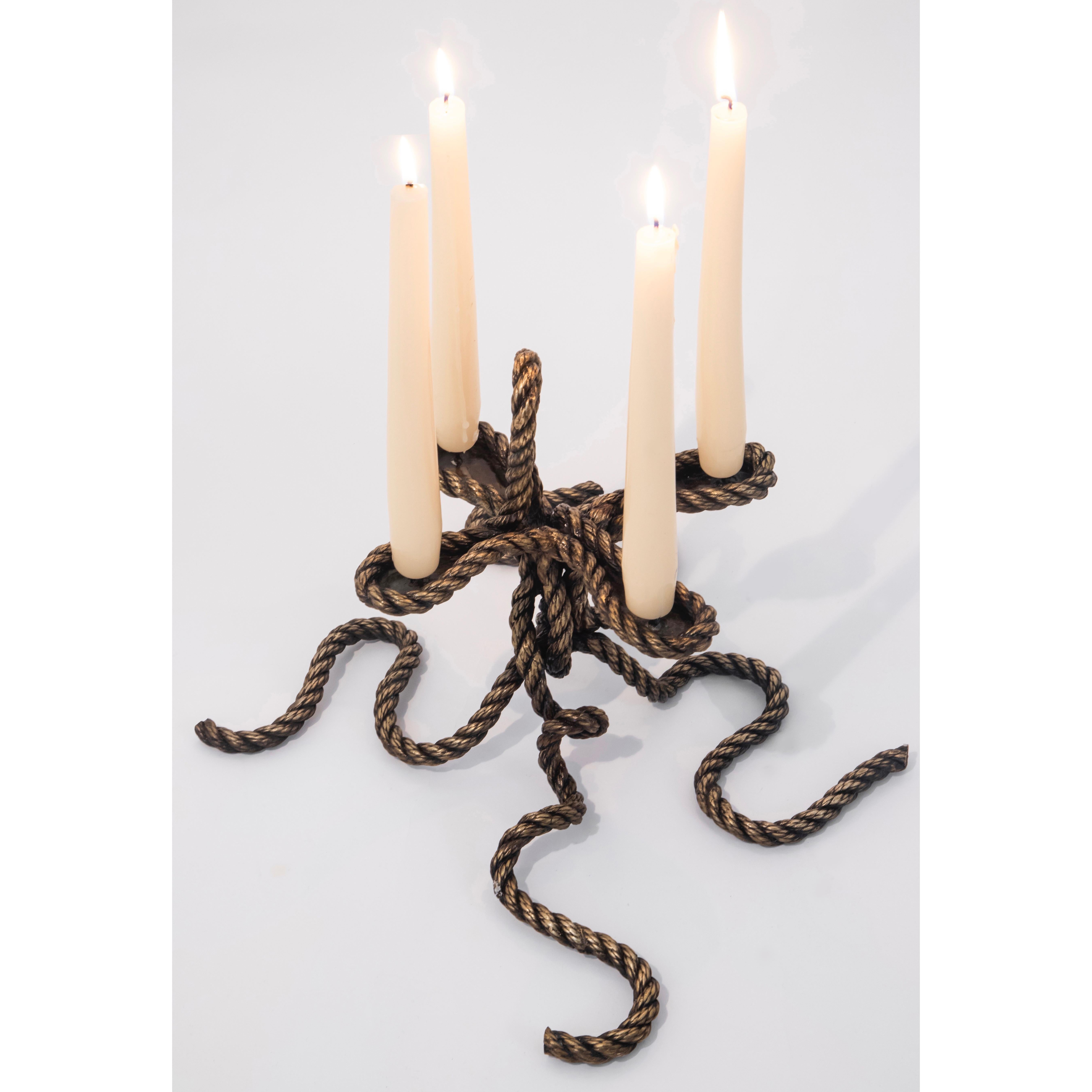 Casted bronze twisted rope candelabra.
  