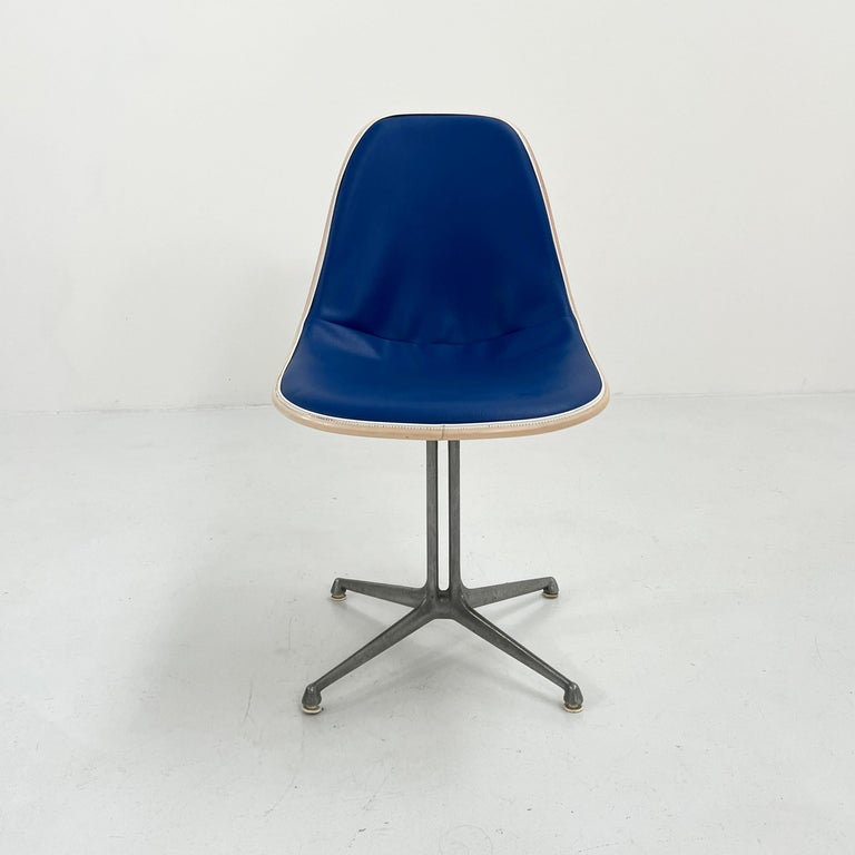 Designer - Charles and Ray Eames
Producer - Herman Miller
Model - La Fonda Dining Chairs
Design Period - Sixties
Measurements - Width 47 cm x Depth 46 cm x Height 84 cm x Seat Height 45 cm
Materials - Fiberglass, metal, leatherette 
Color -