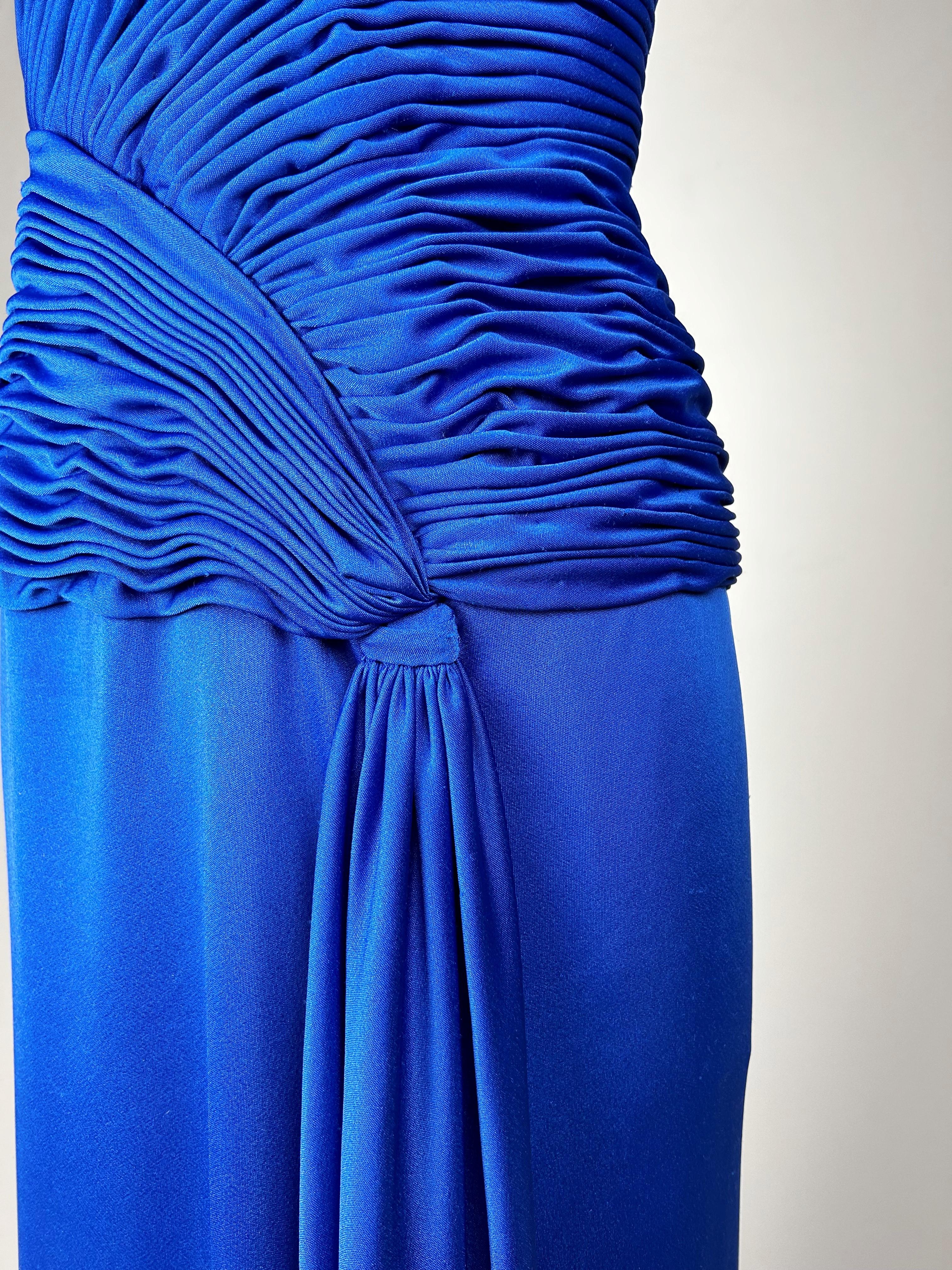 Electric blue lycra jersey evening dress by Loris Azzaro Couture Circa 1980 For Sale 12