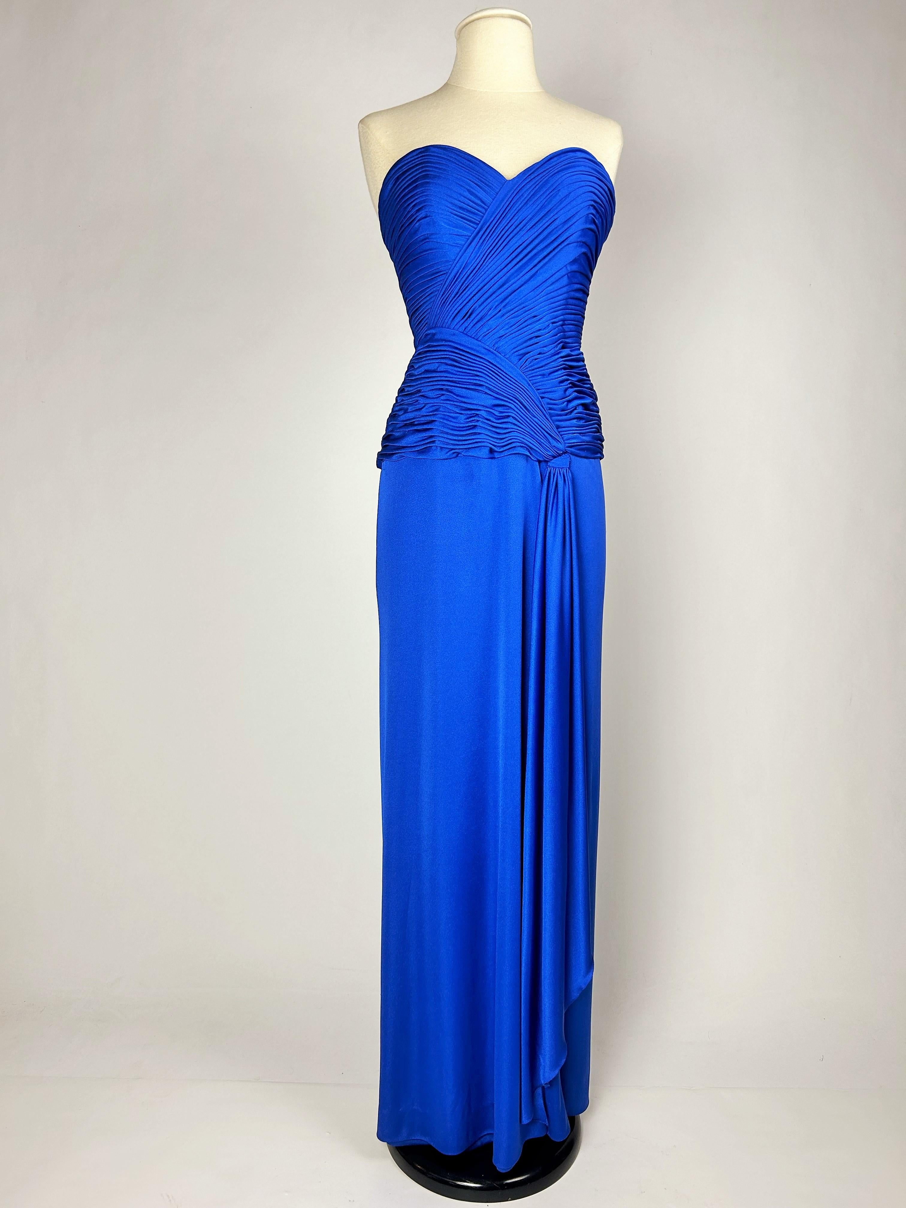 Electric blue lycra jersey evening dress by Loris Azzaro Couture Circa 1980 For Sale 2