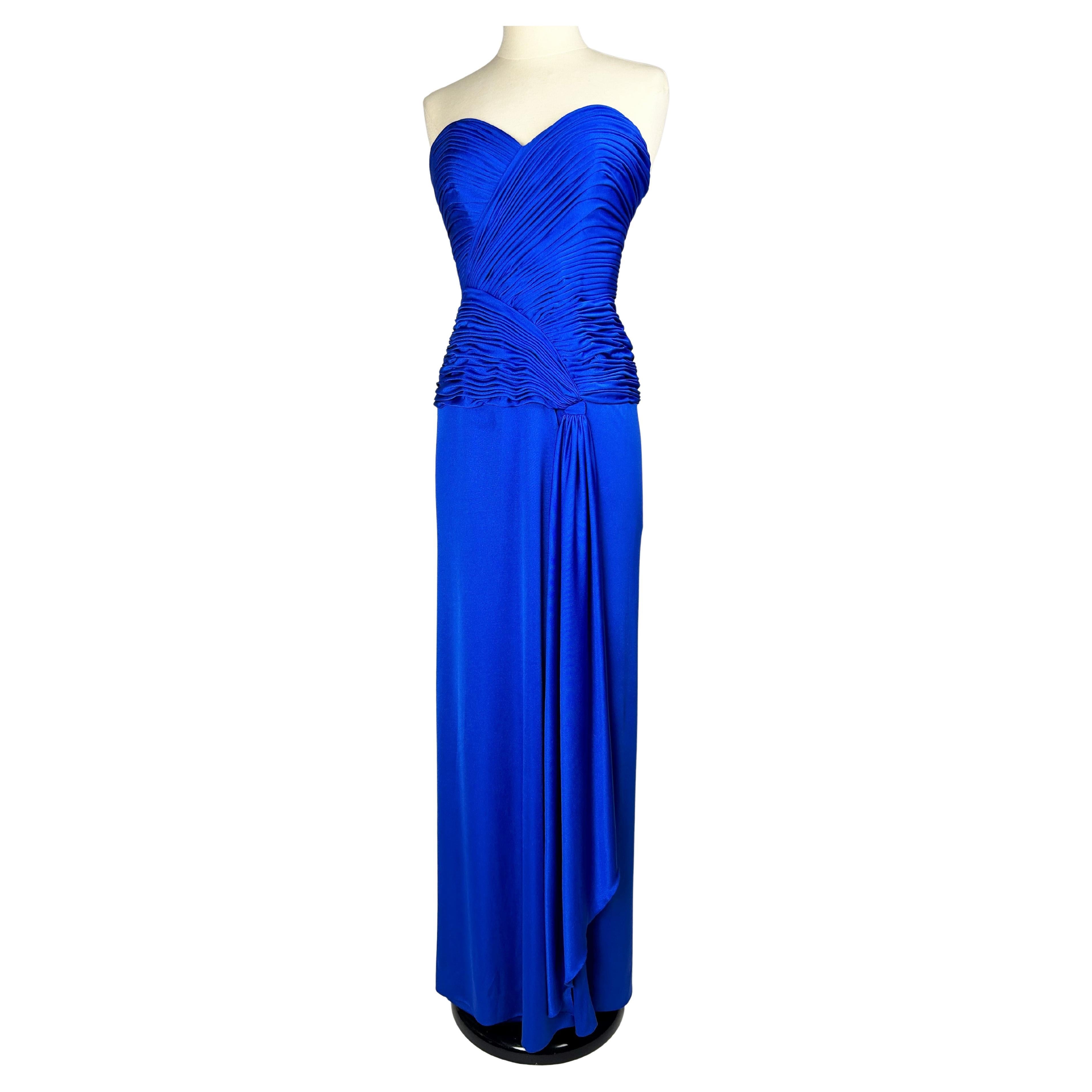 Electric blue lycra jersey evening dress by Loris Azzaro Couture Circa 1980 For Sale