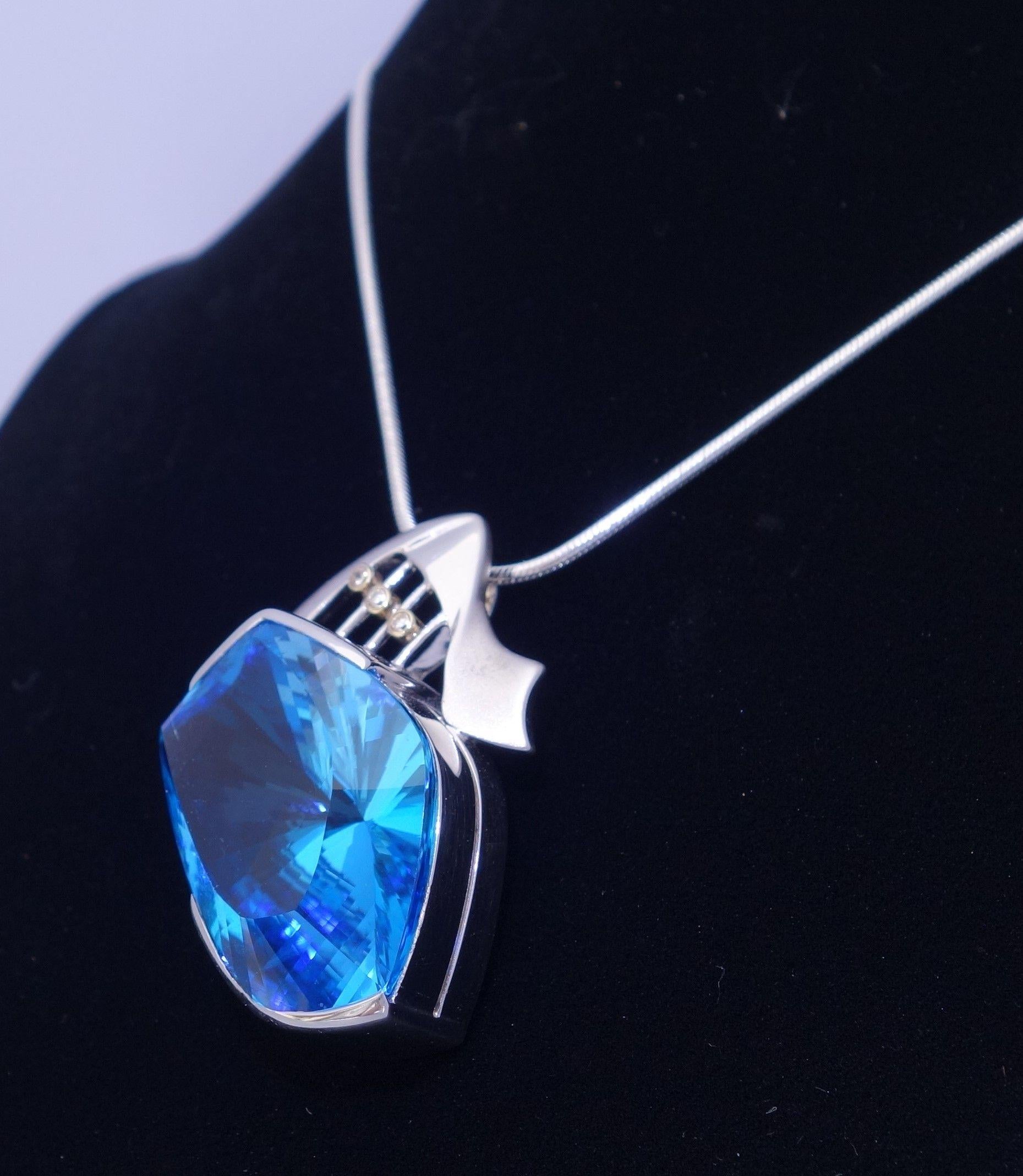 Women's Electric Blue Topaz and Diamond Gold and Sterling Silver Pendant Necklace For Sale