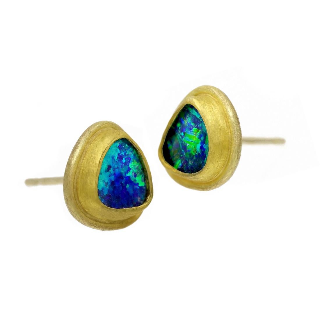 Opal Doublet Earrings handcrafted by acclaimed jewelry maker Petra Class featuring a fantastic matched pair of deep blue Australian opal doublets with strong electric green fire, bezel-set and framed in the artist's intricately-textured 22k yellow