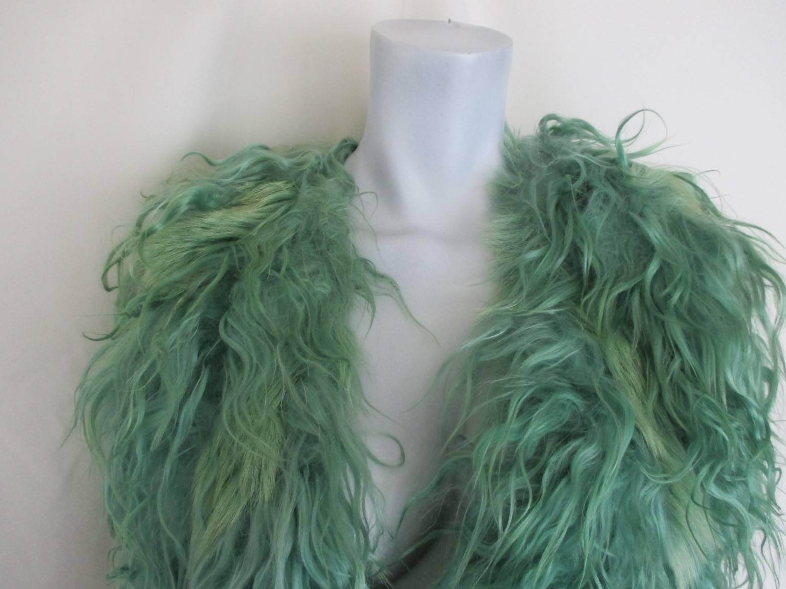 We offer more fur items, view our frontstore

This vintage Mongolian lamb vest is with 2 pockets and 1 closing hook.
The lining is worn and needs to be replaced.
Made by 