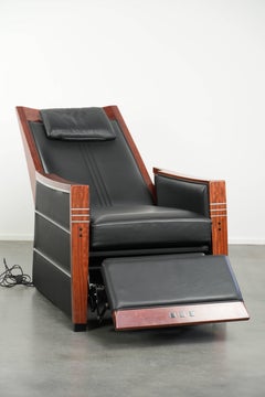 Electrically adjustable Art Deco design recliner with black cowhide leather