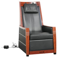 Electrically adjustable Art Deco design recliner with black cowhide leather