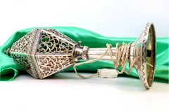 Electrified silver table lamp with pierced body and circular base