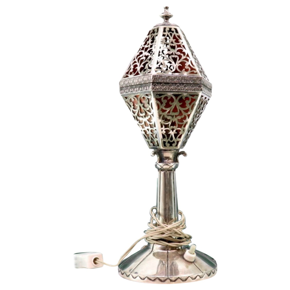 Electrified silver table lamp with pierced body and circular base