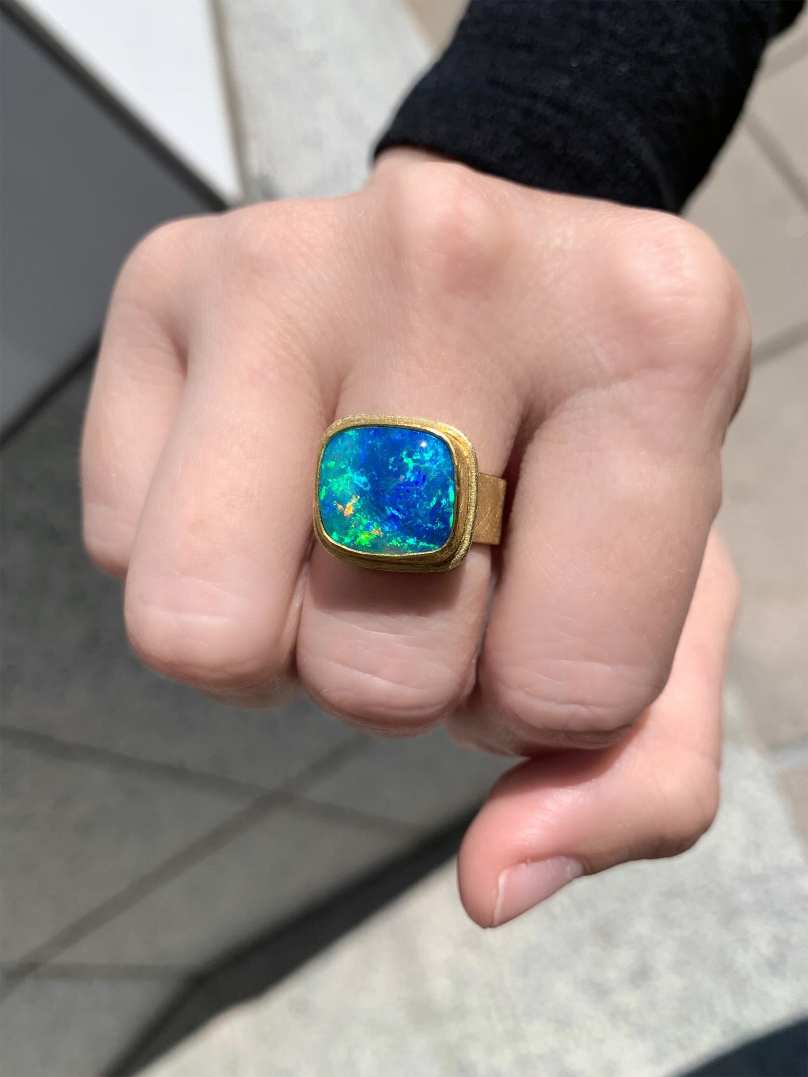 Double Framed Ring handmade by award-winning jewelry artist Petra Class featuring a spectacular, magical Australian crystal opal free-form cabochon bezel-set and double-framed in the maker's signature finely-textured 22k yellow gold atop a 7mm wide