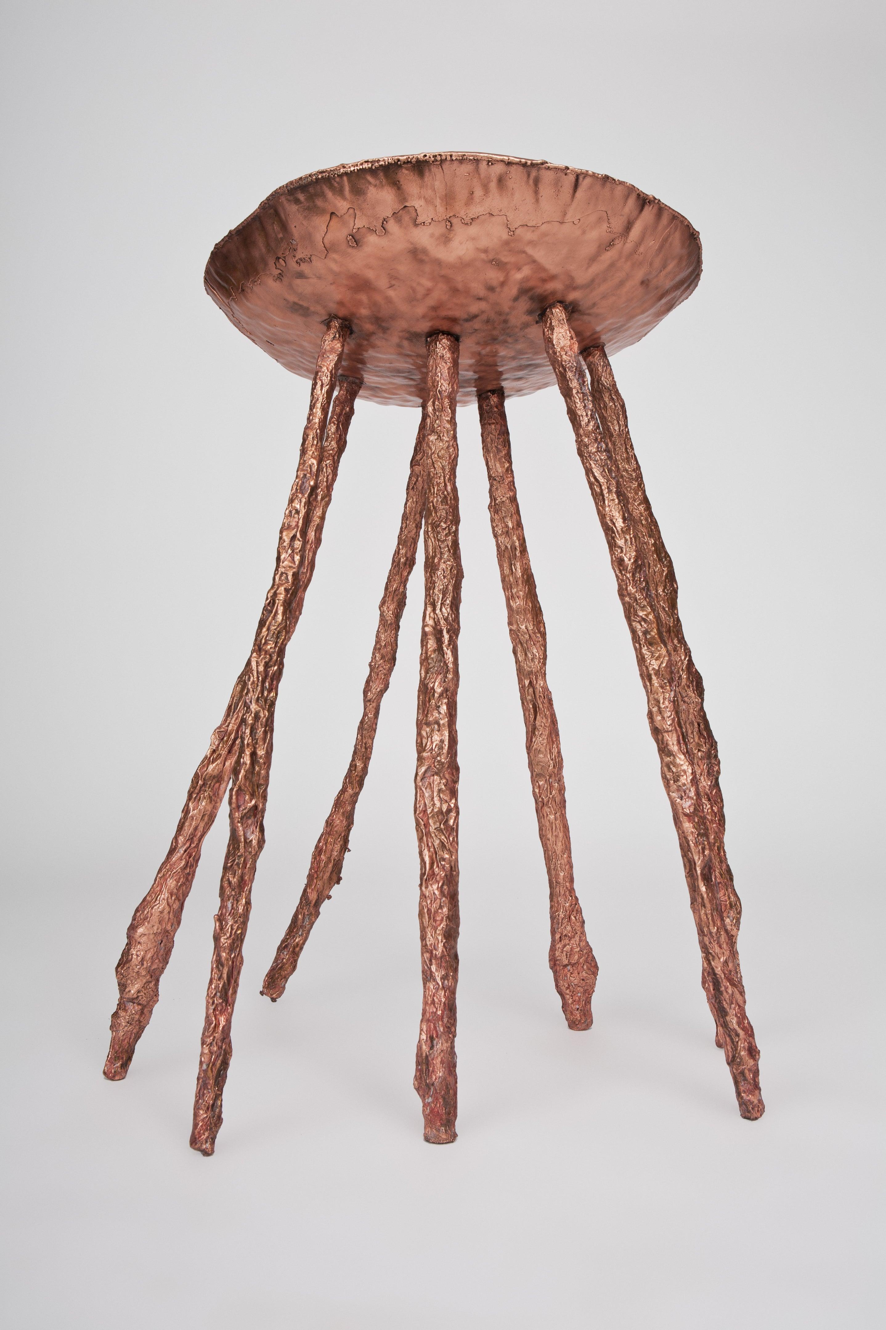 Michael Gittings Studio.
Electroformed side table
Hand beaten copper top
Electroformed copper legs.
Dimensions: 40 cm, 60 cm, 40 cm.
Limited edition of 3.

Michael Gittings
Melbourne based designer Michael Gittings aims to
Challenge