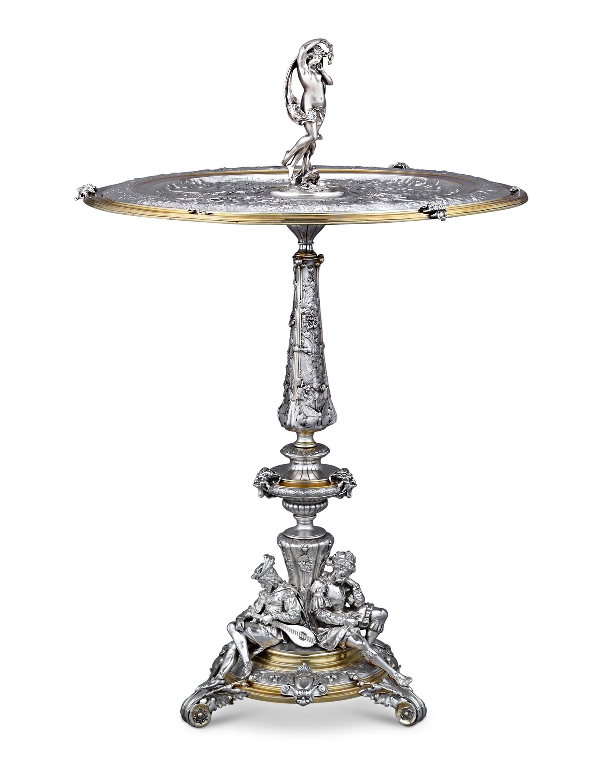 This remarkable and historic parcel-gilt electroplate table hails from renowned British firm Elkington & Co., the distinguished company that invented the art and science of silver plating. By the 1830s, they were awarded a patent for this