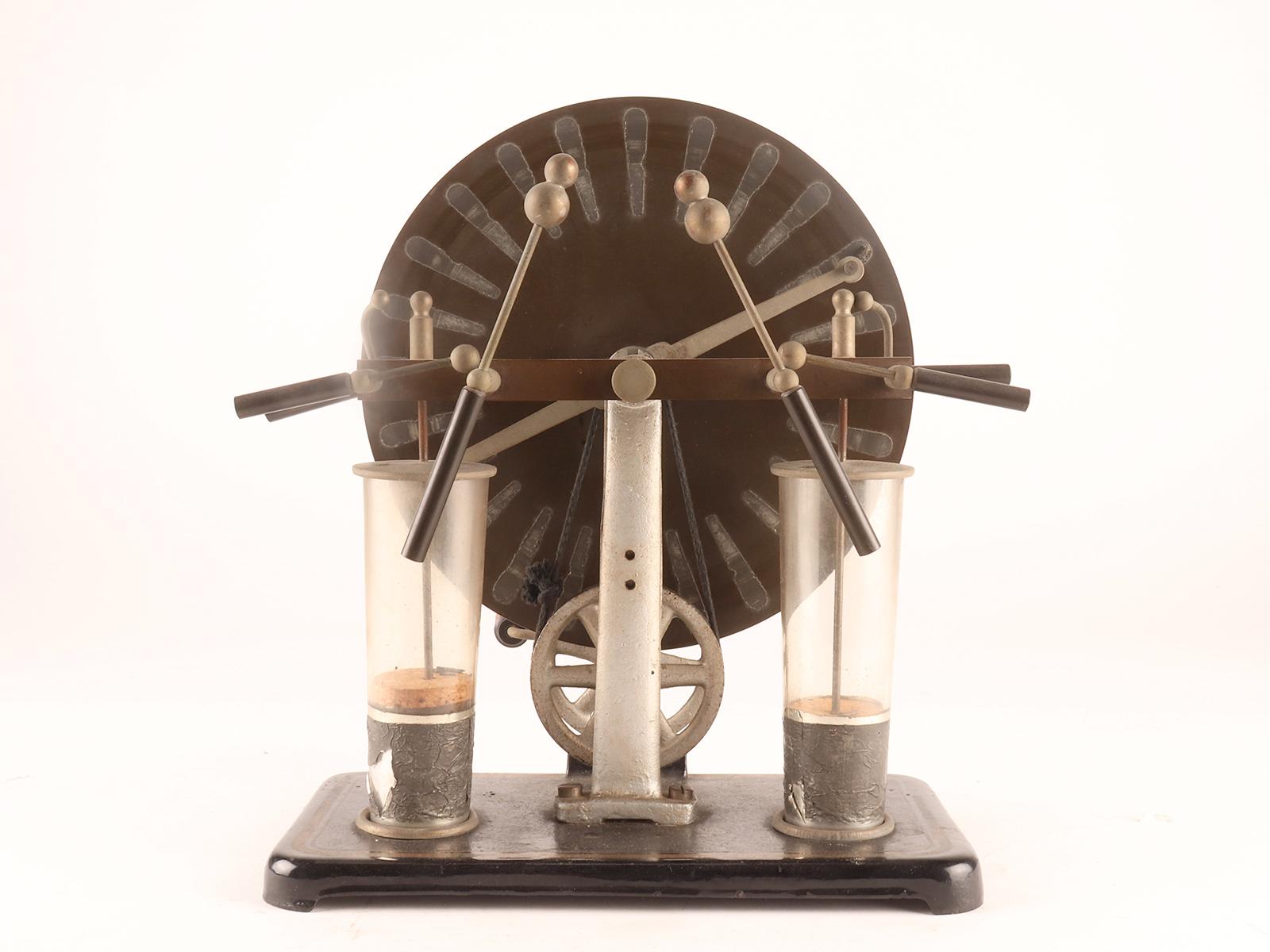 Metal Electrostatic machine by Wimshurst, designed by Rinaldo Damiani, Italy 1900.  For Sale