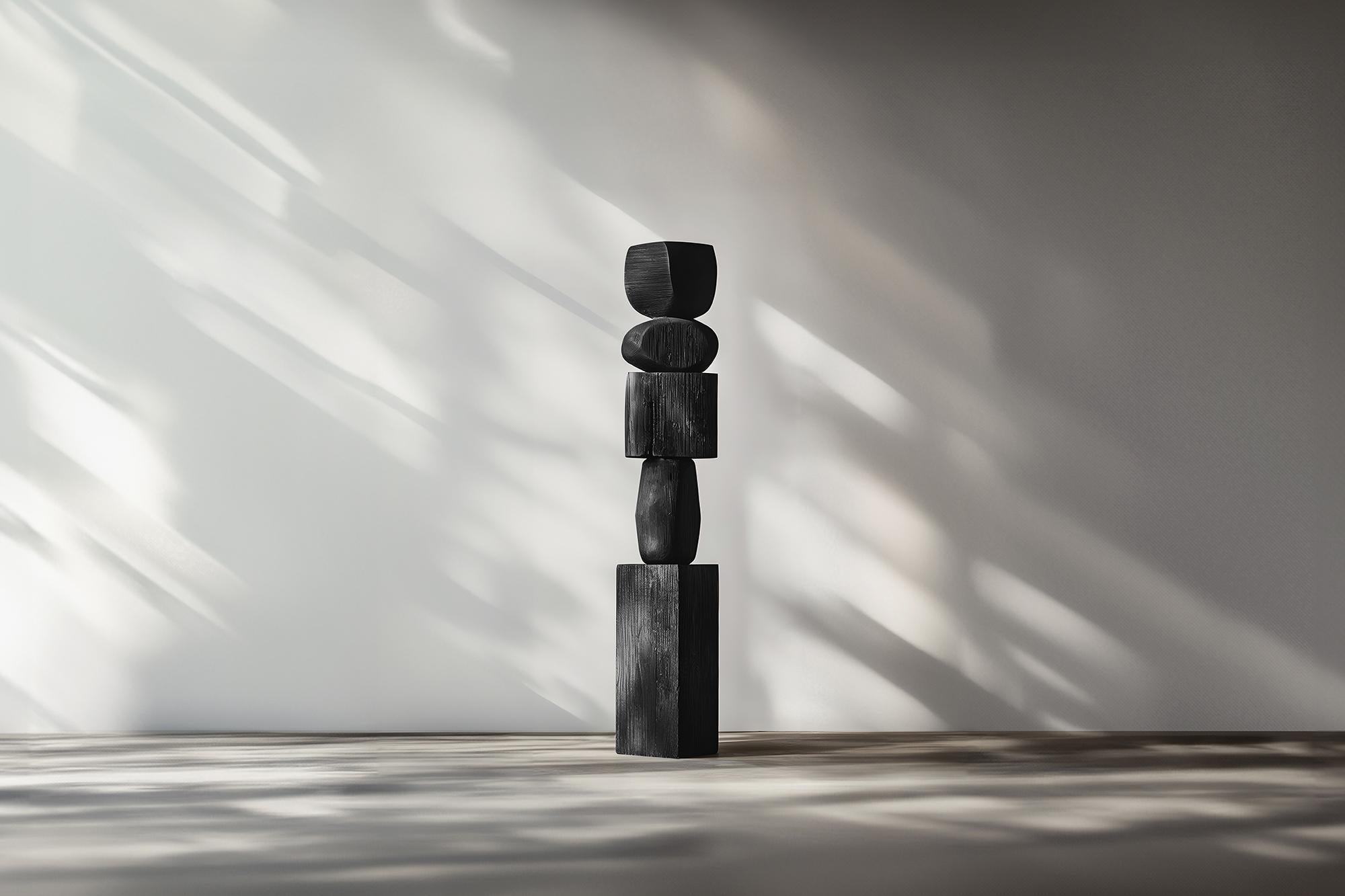 Elegance in schwarzem Massivholz von NONO, Stillstand No78 neu definiert

--


Die stehenden Holzskulpturen von Joel Escalona sind Objekte von rauer Schönheit und heiterer Anmut. Jedes einzelne ist ein Zeugnis für die Kraft des Materials, mit