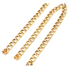 Conjunto de joyas Elegance de oro amarillo de 14 quilates entrelazadas: Collar y Pulsera