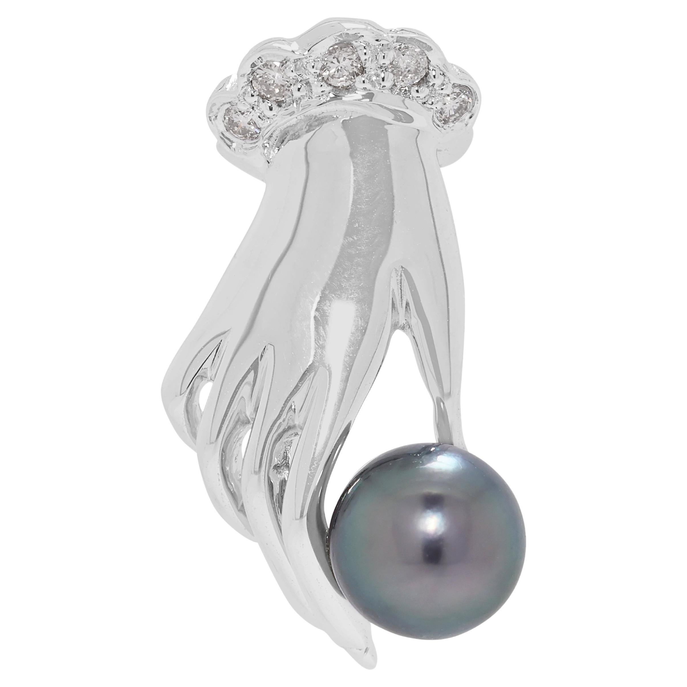 Elegant pendentif en or blanc 18 carats serti d'un diamant naturel de 0,02 ct et d'une perle des mers du Sud en vente