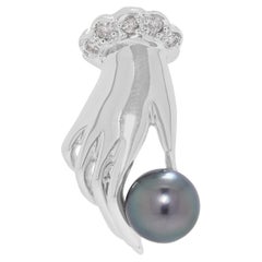 Elegant pendentif en or blanc 18 carats serti d'un diamant naturel de 0,02 ct et d'une perle des mers du Sud
