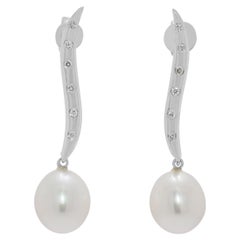 Elegant 0.12ct Diamond 
South Sea Pearl Earrings in 18K White Gold