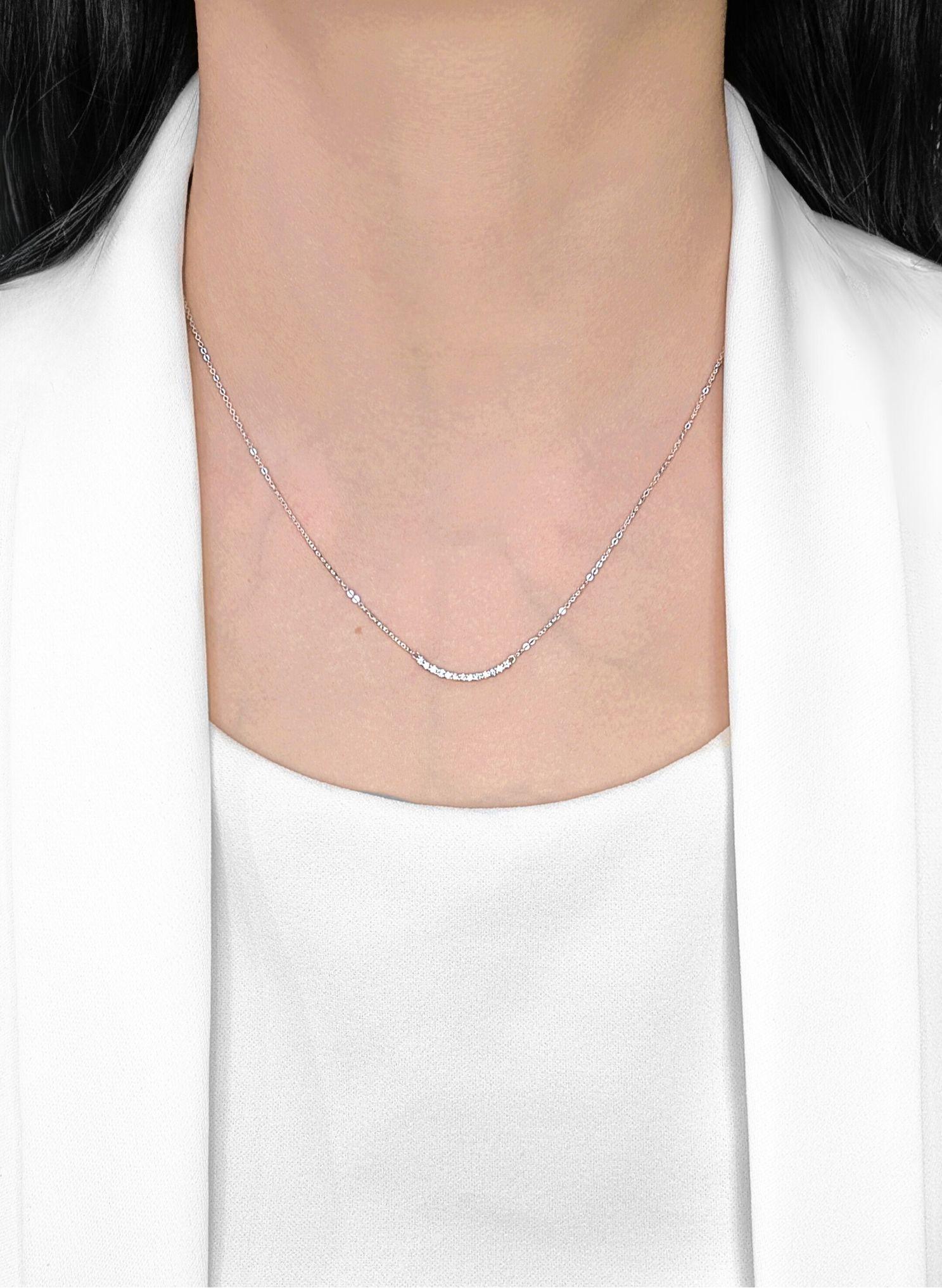 This elegant necklace features 13 round brilliant-cut natural diamonds (0.19ct total), delicately set in a curved bar of 18K white gold. With G-H color and VS clarity, each diamond sparkles with timeless brilliance, making it the perfect everyday