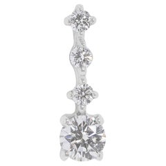 Elegant pendentif en or blanc 18 carats orné d'un diamant naturel de 0,28 ct.
