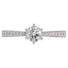 Élégante bague pavée de diamants naturels 0,38 carat en or blanc 18 carats