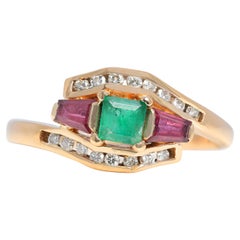 Elegant 0.53 carat Emerald & Sapphire Ring with Diamonds in 18K Yellow Gold