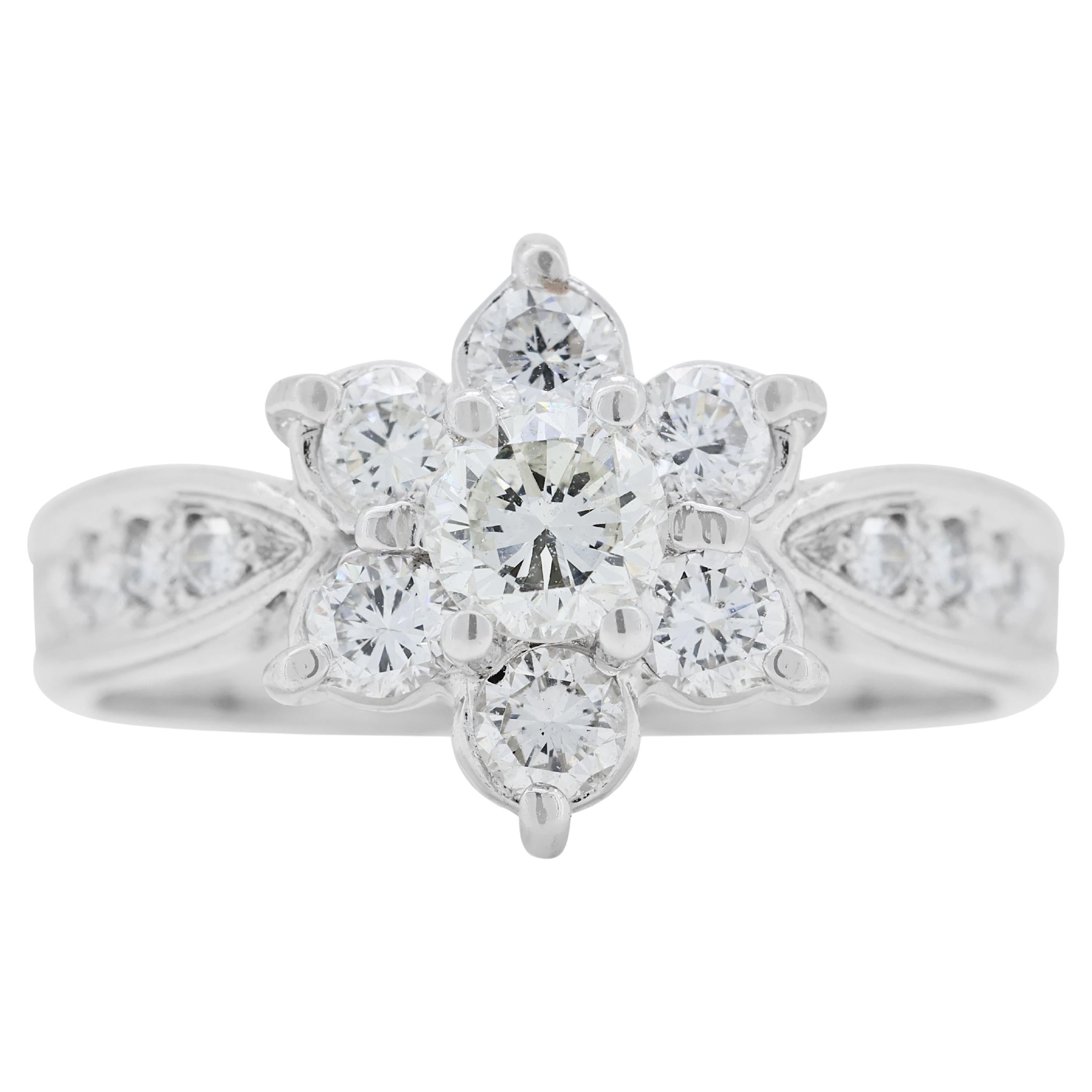 Élégante bague en forme de fleur en or blanc 18 carats et diamants 0,56 carat