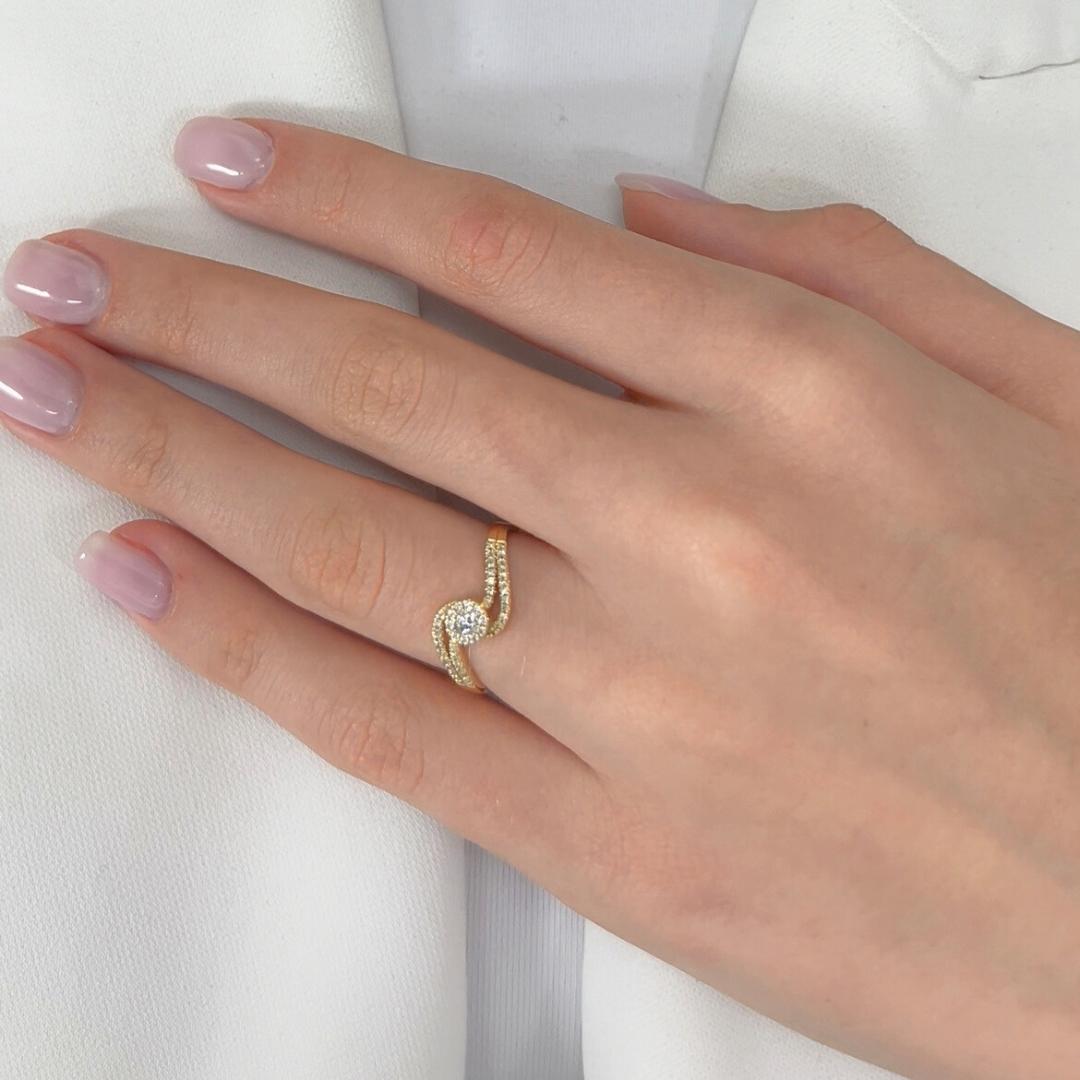Elegant 0.60ct Diamonds Pave Ring in 14k Yellow Gold - IGI Certified

Crafted in rich 14K yellow gold, this delicate yet radiant ring features a brilliant 0.10ct round diamond at its center, accentuated by 50 shimmering side diamonds with 0.50ct.