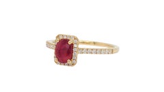 Elegant 0.62ct Oval Ruby Diamond Halo Ring in 18K Yellow Gold