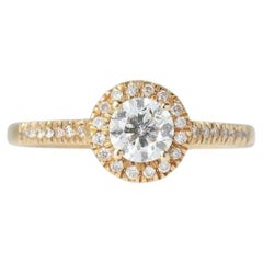 Elegant 0.65ct Halo Diamond Ring in 18K Yellow Gold