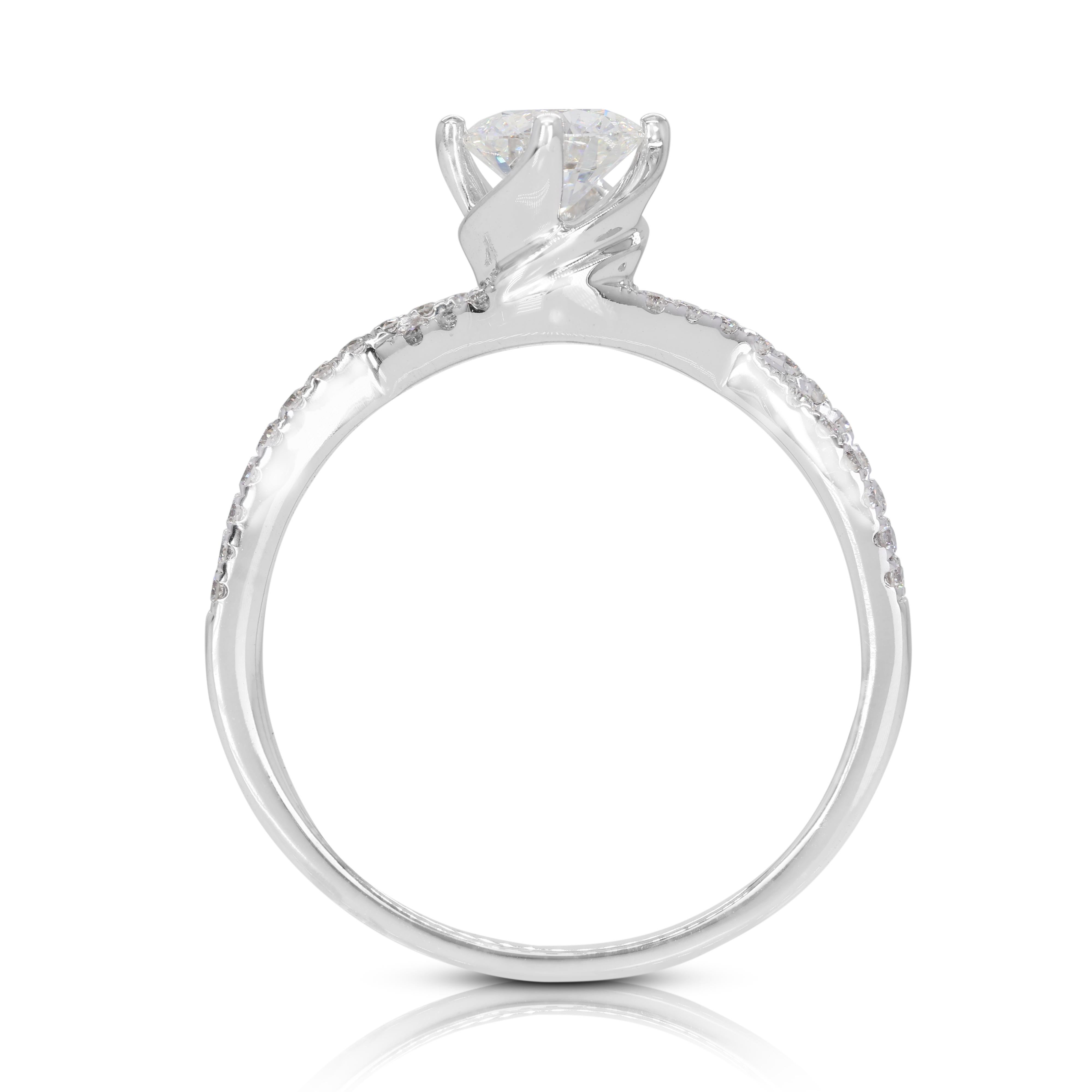 Elegant 0.70ct Diamond Halo Ring set in 18K White Gold In Excellent Condition For Sale In רמת גן, IL