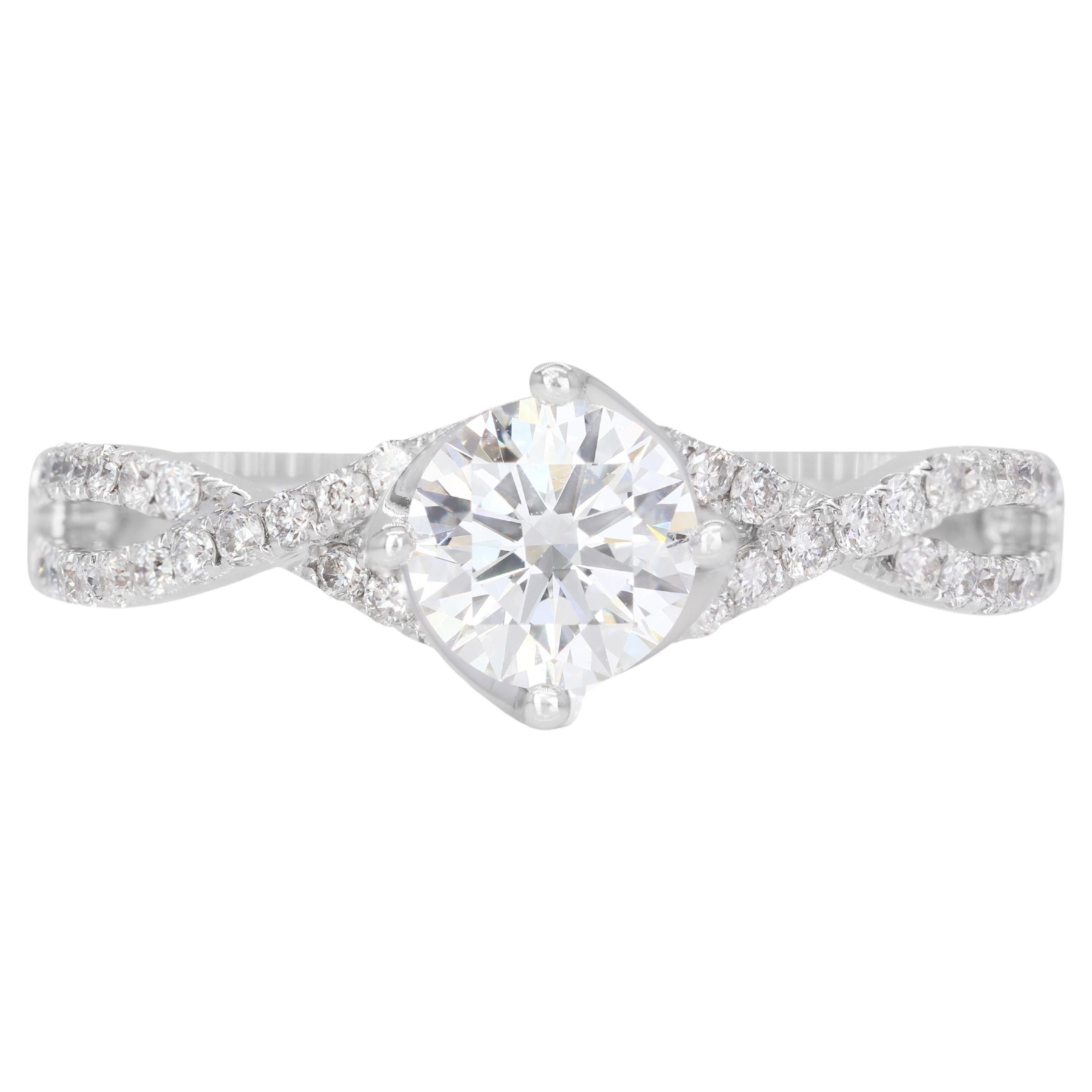 Élégante bague halo de diamants 0,70 carat sertie en or blanc 18 carats