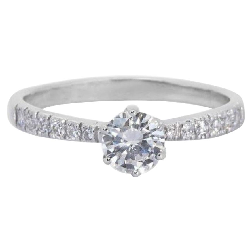 Elegante anello con diamante rotondo da 0,72 carati