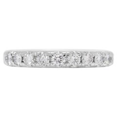 Elegante bague en or blanc 18 carats ornée d'un diamant naturel de 0,75 ct.